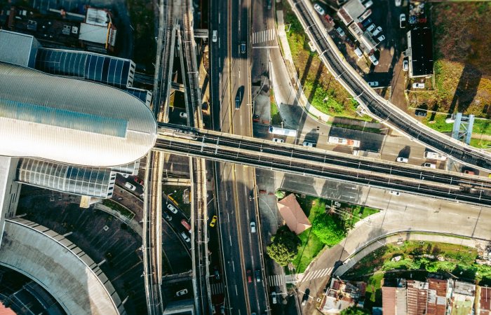 Aerial view showcasing Panama City's complex urban infrastructure with highways and buildings.
